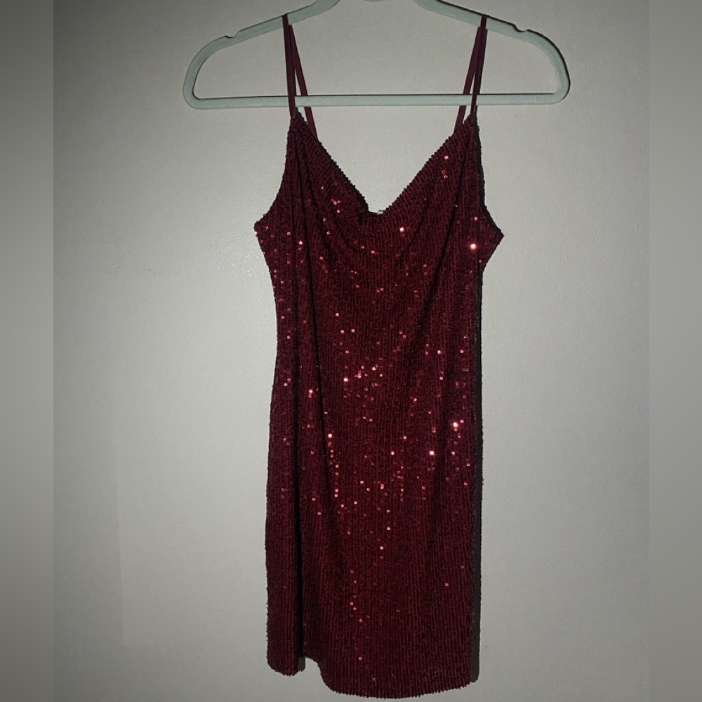 Sparkly Red dress fitted with drop front